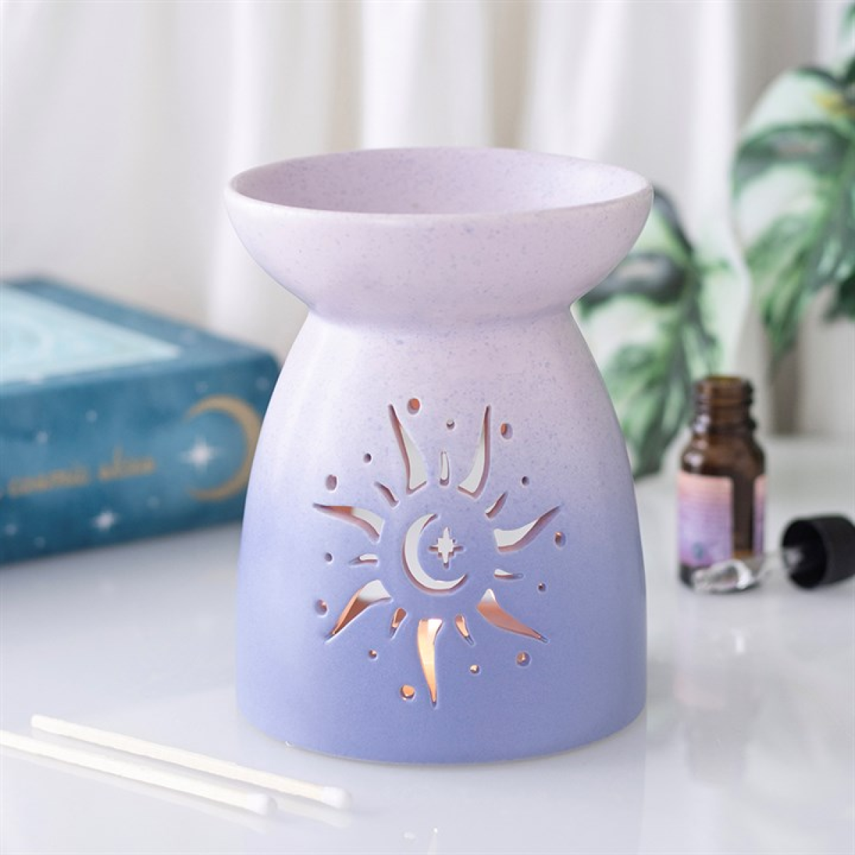 Patel Skies Sun Cut Out Oil Burner